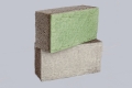 Block mit einer Schicht aus texturierten «Ragged Stone» (grün, blau)